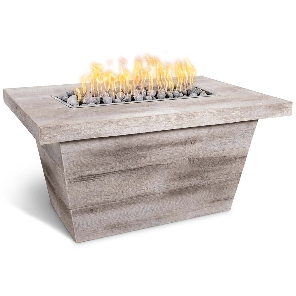Rectangular concrete gas fire pit with light wood-grain finish and burning flames in tray