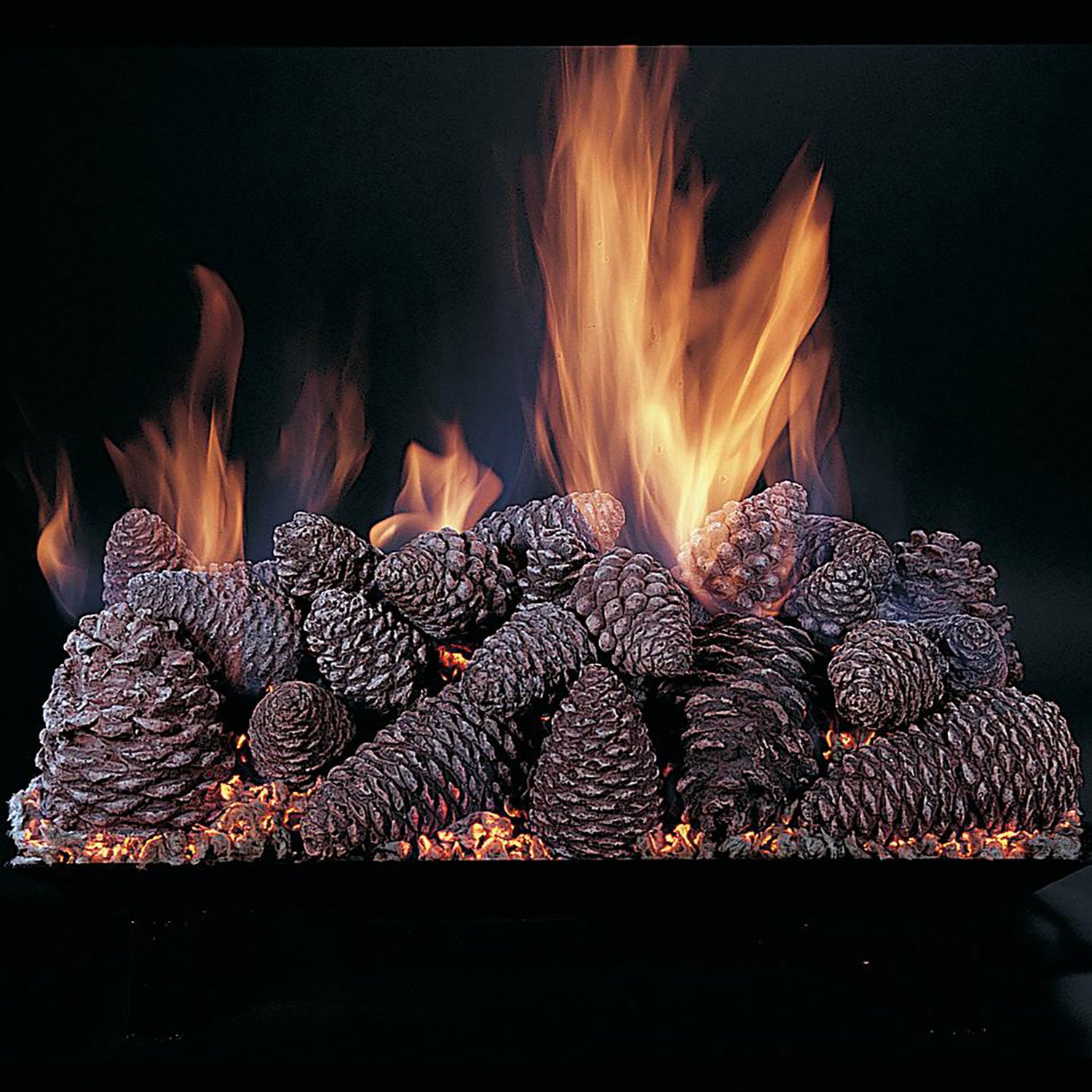 Gas fireplace log set with dark pine cones and flames