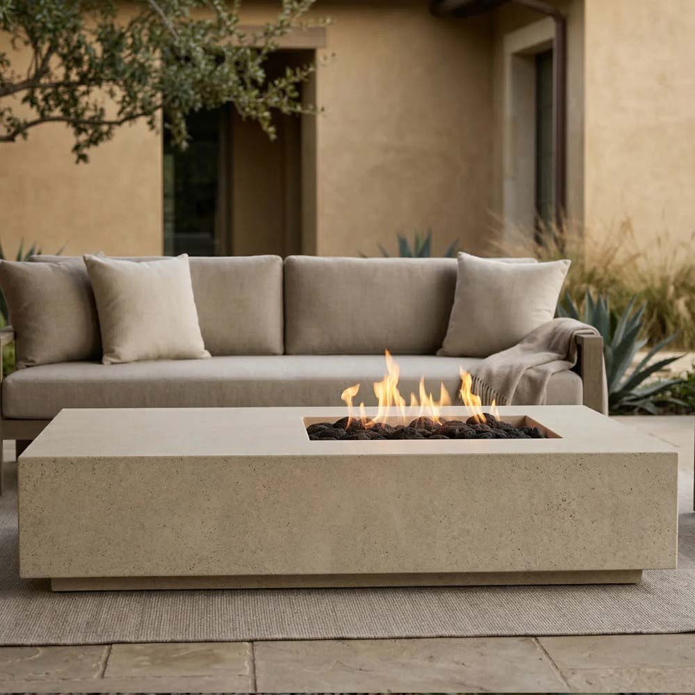 Rectangular concrete gas fire pit with flames, light beige/tan finish
