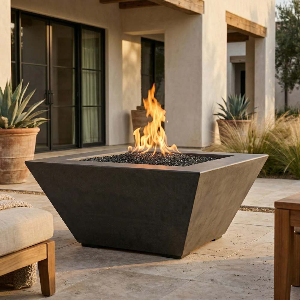 Square concrete gas fire pit with open flame, dark charcoal finish