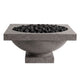 Gray concrete gas fire bowl with lava rocks in open burner