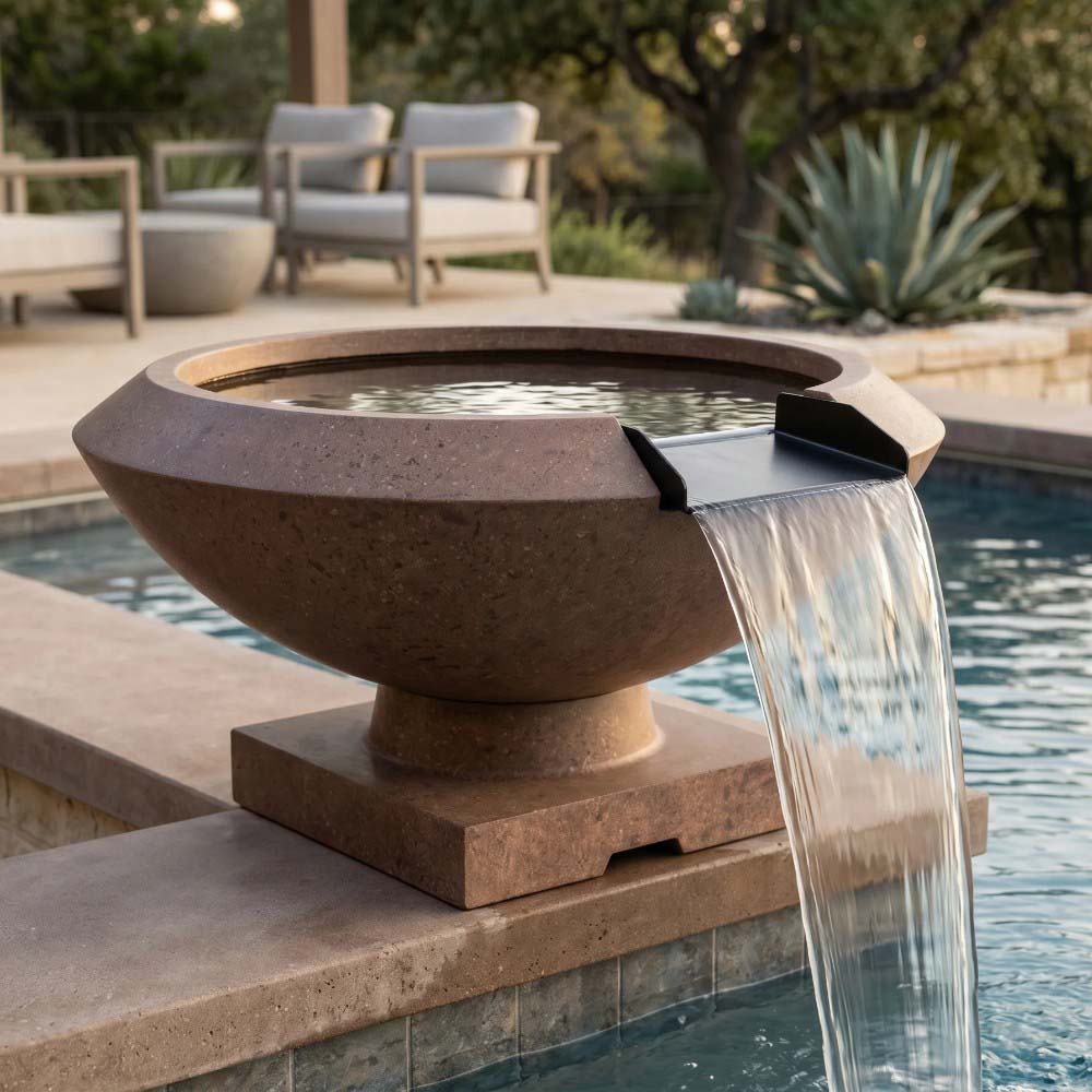 Brown concrete gas fire and water bowl with water stream pouring from side