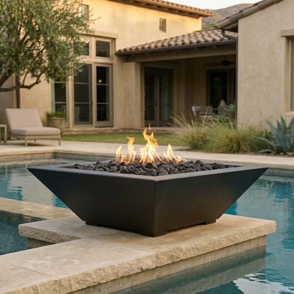 Dark concrete gas fire bowl with trapezoid sides and burning flames over lava rocks