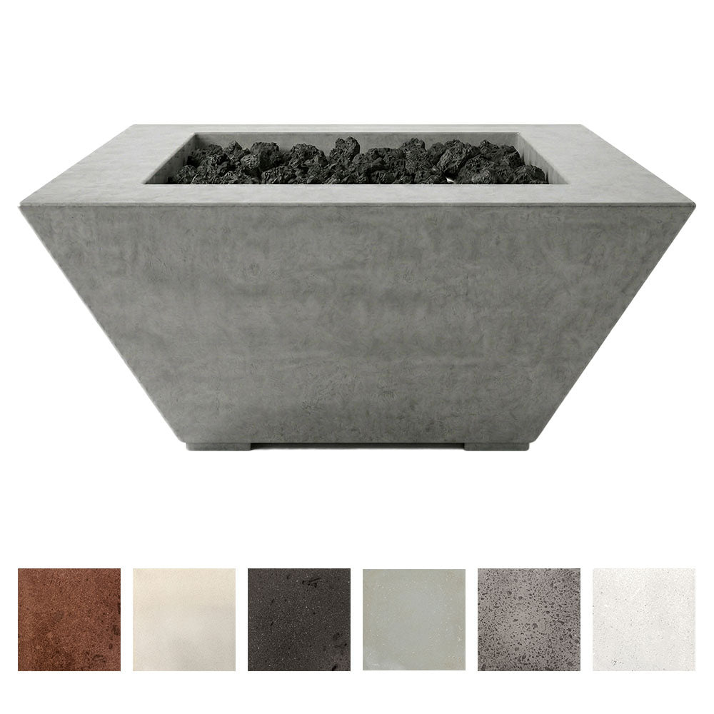 Tall concrete gas fire pit with black lava rocks, square opening, gray finish.
