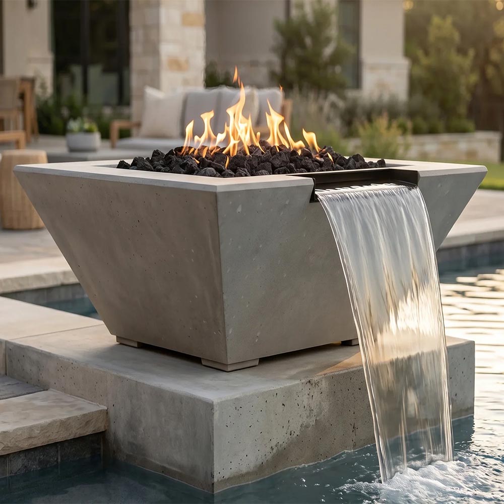 Gray concrete gas fire and water pit with waterfall stream and burning flames