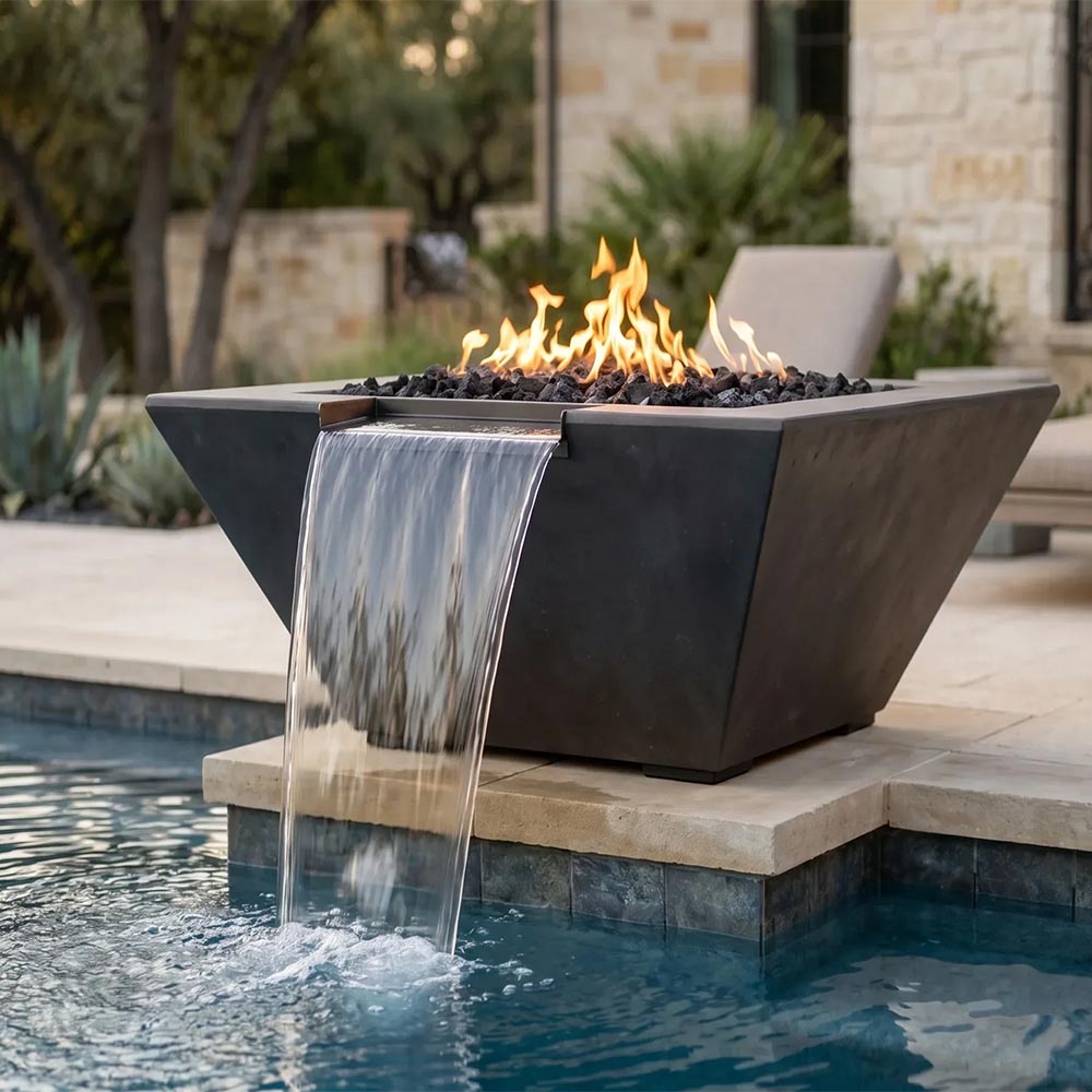 Tall concrete gas fire and water pit with water spillover and burning flames