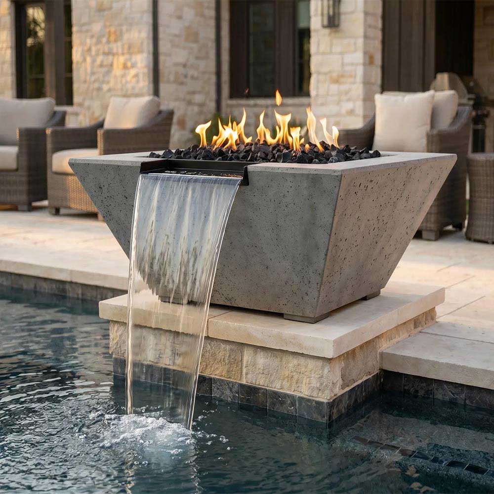 Concrete gas fire and water pit with waterfall stream, lava rocks, and flames