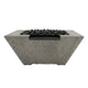 Speckled gray concrete gas fire and water pit with lava rocks and black burner