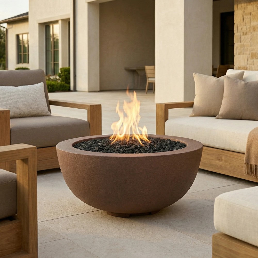 Concrete gas fire pit with warm brown bowl, glowing flames, and black burner insert.
