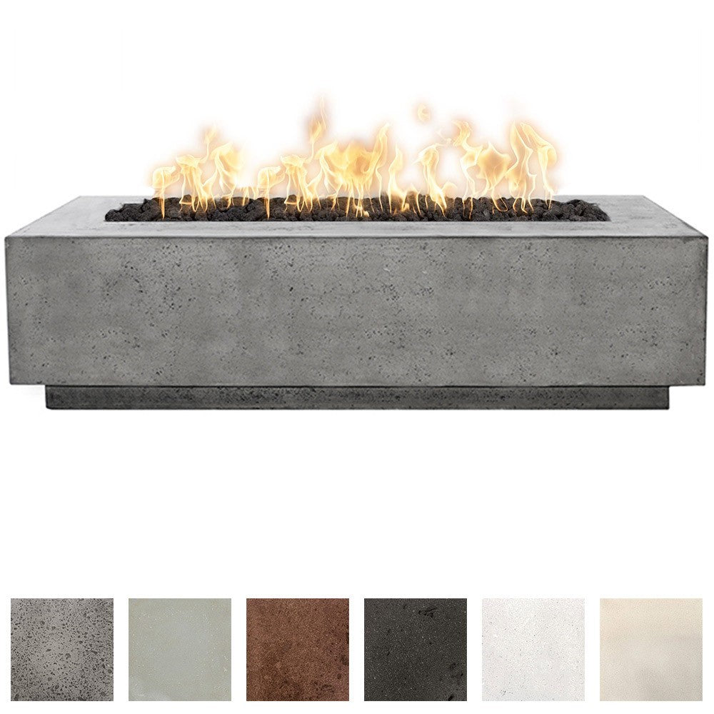 Rectangular concrete gas fire pit with burning flames in the center