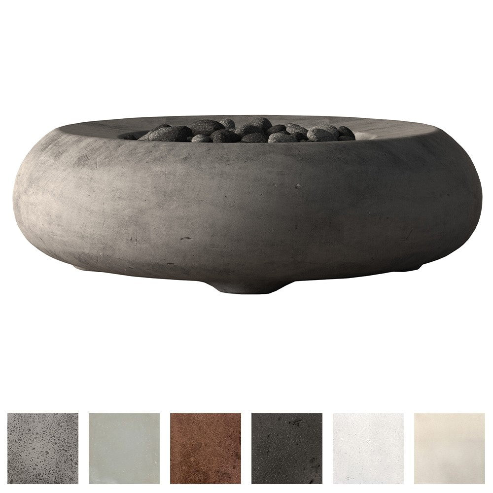 Dark gray concrete gas fire bowl with burner tray and small stones inside.