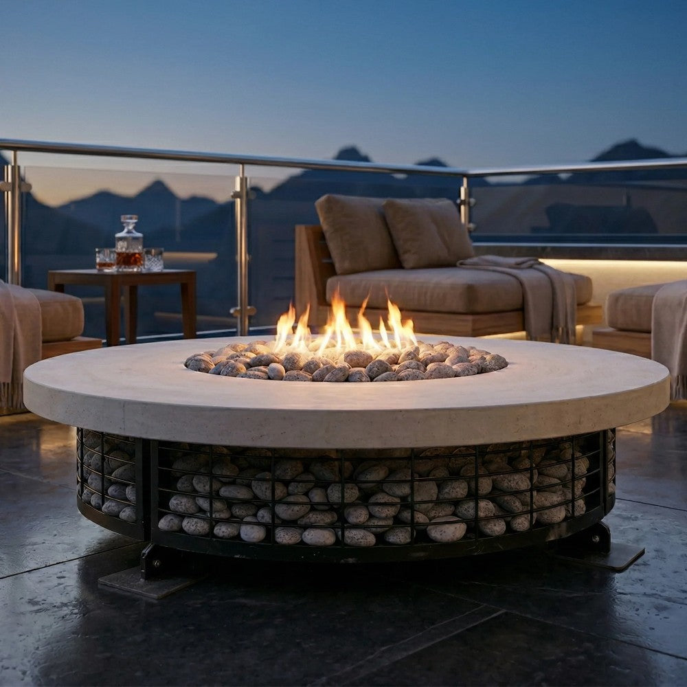 Outdoor round concrete gas fire pit with electronic ignition, visible flames over lava rocks
