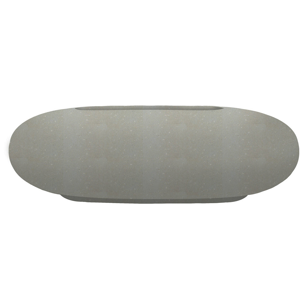 Light gray pebble concrete gas fire pit with smooth oval bowl profile