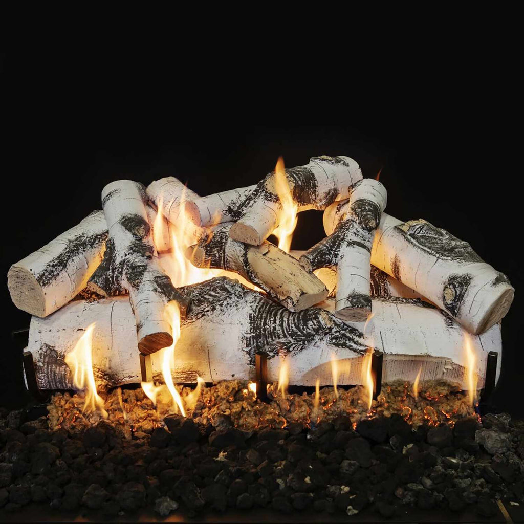 Quaking aspen gas logs arranged in a log pattern with multiple flames