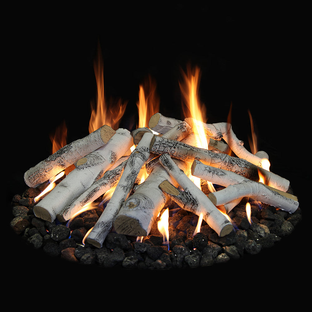 Fire pit burner with light gray logs over black lava rock and orange flames