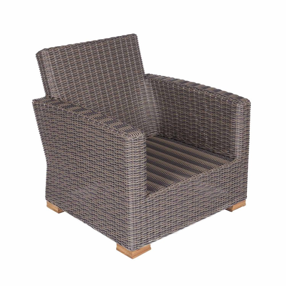 Outdoor club chair with dark woven wicker frame and striped seat cushion