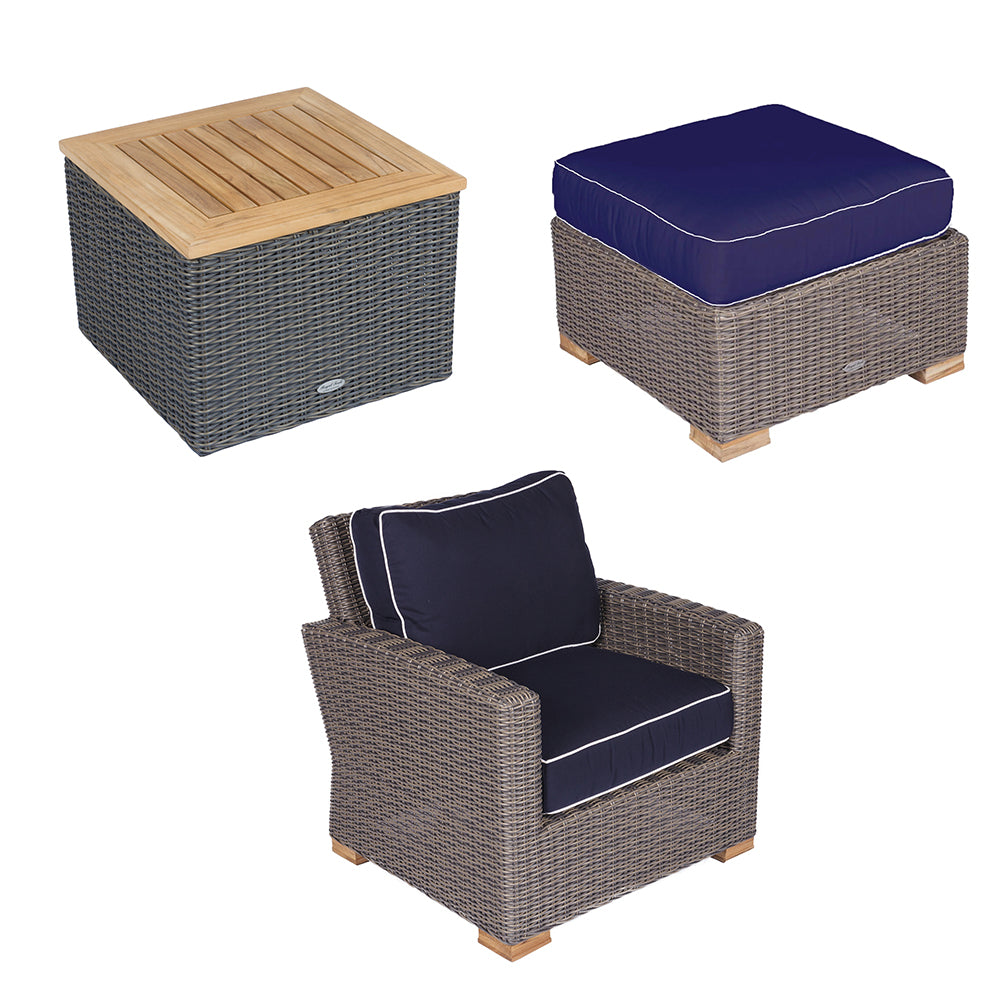 Wicker ottoman and armchair set with slatted wood bases and navy cushion pads with piping
