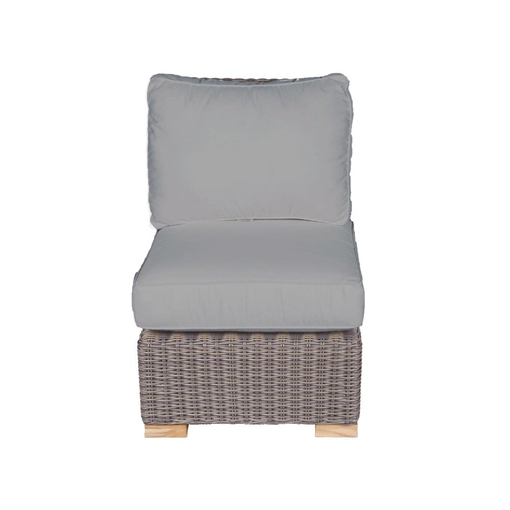 Outdoor chair cushion insert with gray seat and back on woven wicker frame