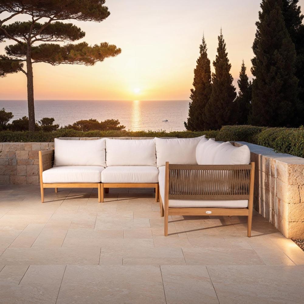Outdoor patio sectional with cream cushions and woven gray back panels on teak wood frame