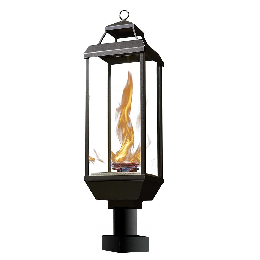 Outdoor gas lantern with dark metal top and side glass, flame visible through window
