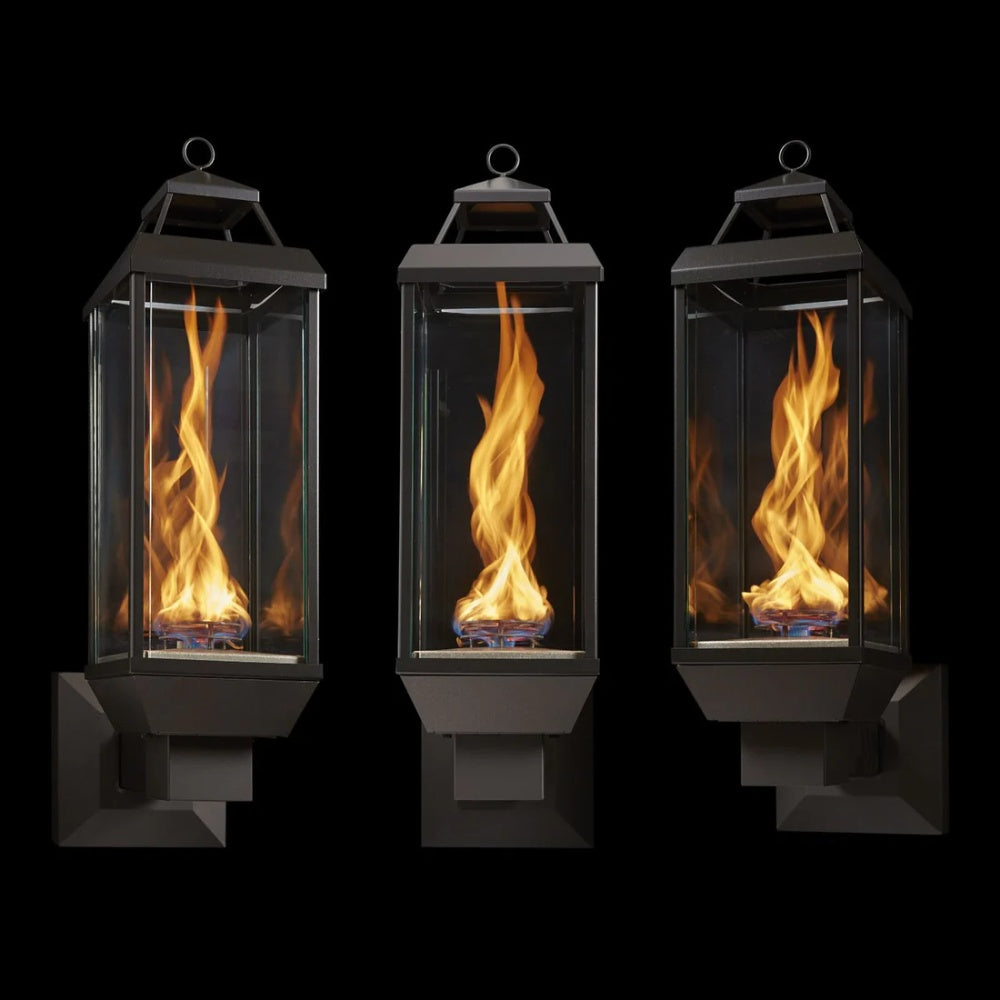 Three-view set of black gas lanterns with glass panels and flames