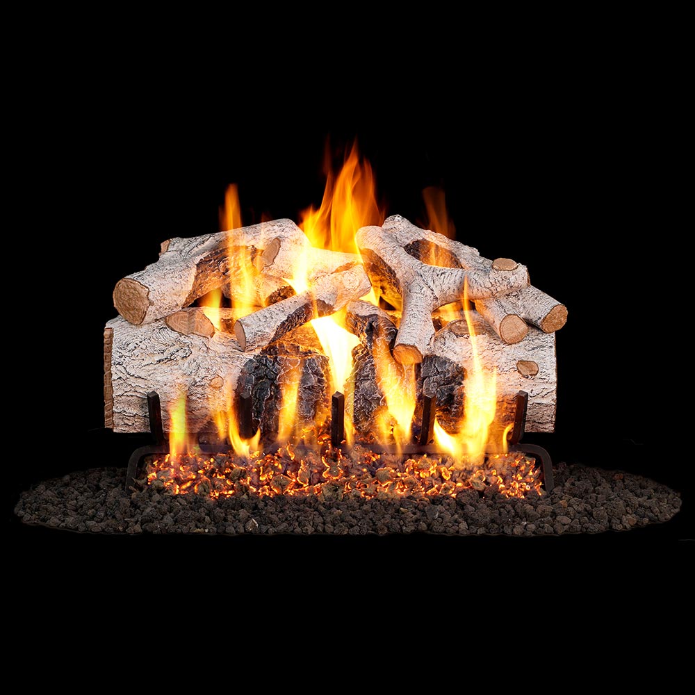 Charred birch gas fire logs with bright flames and ember bed