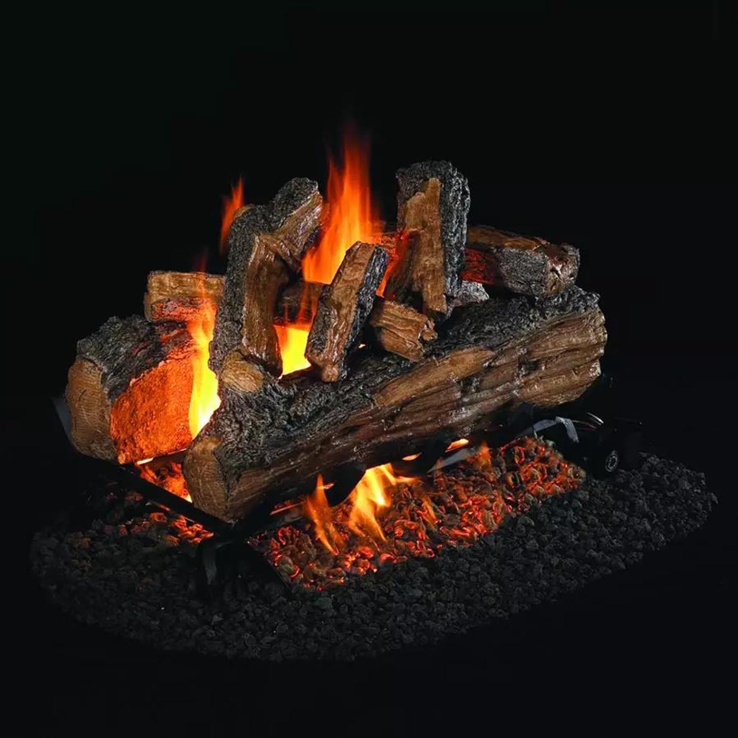 Vented gas log set with split oak logs and bright orange flames