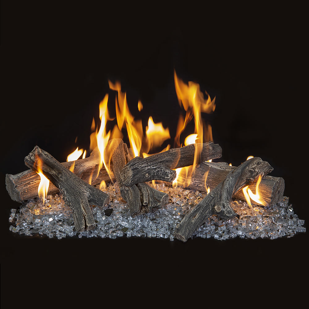 Linear gas log set with driftwood-style logs and glowing flames