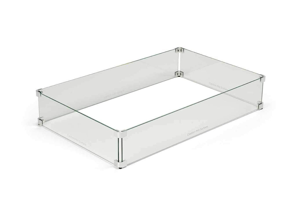 Rectangular clear glass fire pit wind guard with metal corner brackets and posts