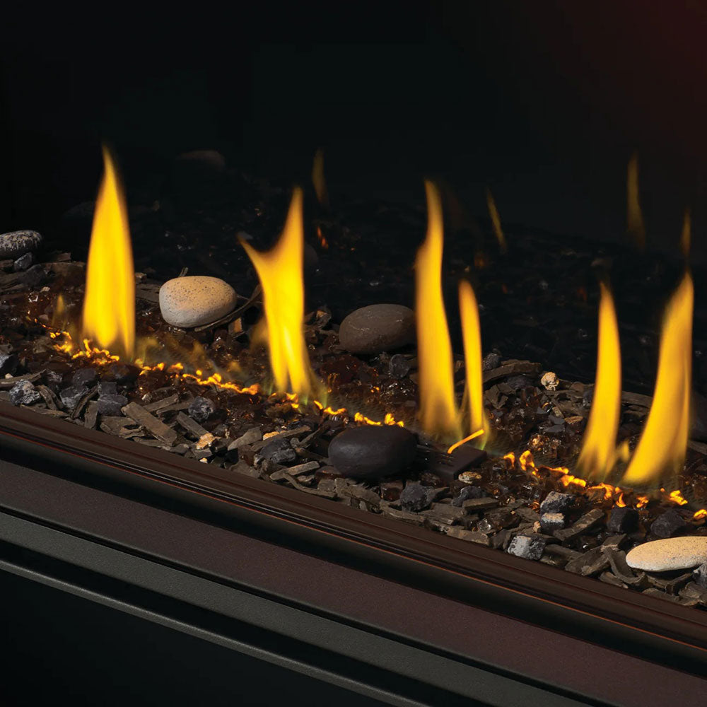 Napoleon Woodland media enhancement kit showing glowing flames among mixed stones and logs