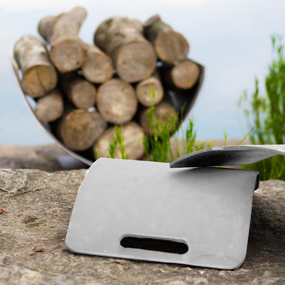 Stainless steel log rack with U-shaped cradle holding firewood logs