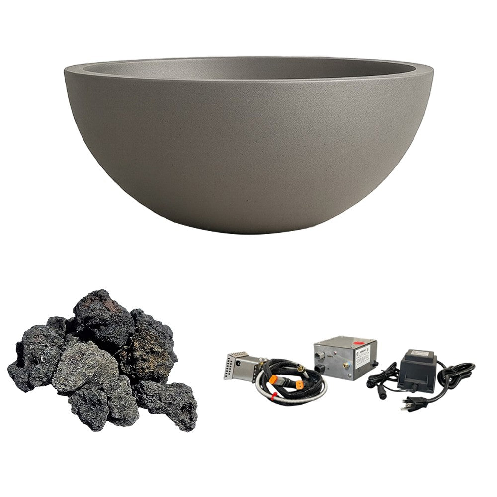 Gray concrete gas fire bowl with dark lava rocks and ignition kit components