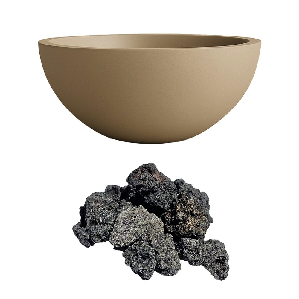 Gas fire bowl with black lava rocks, tan concrete finish