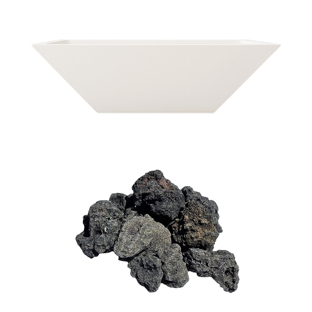 White concrete fire bowl with black lava rock pieces.
