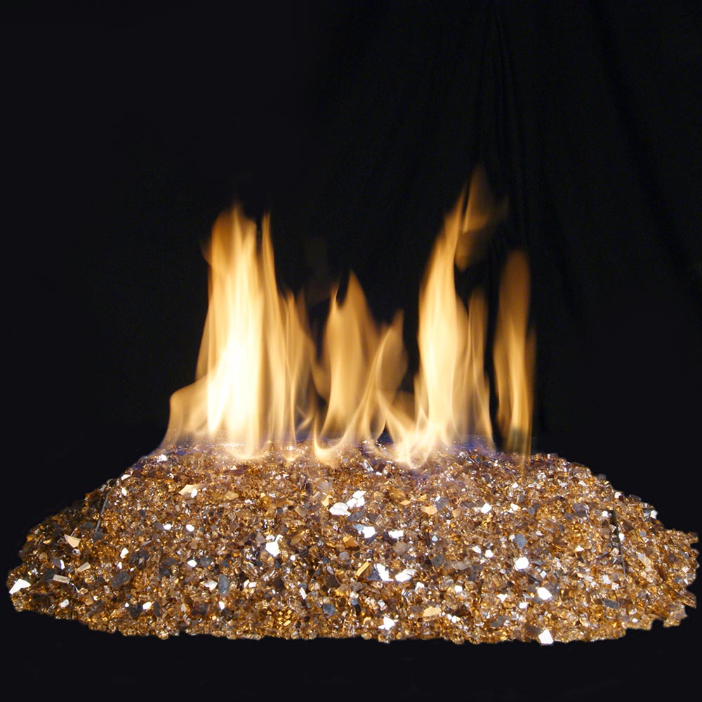 Fire pit bed of copper reflective glass with visible flames above