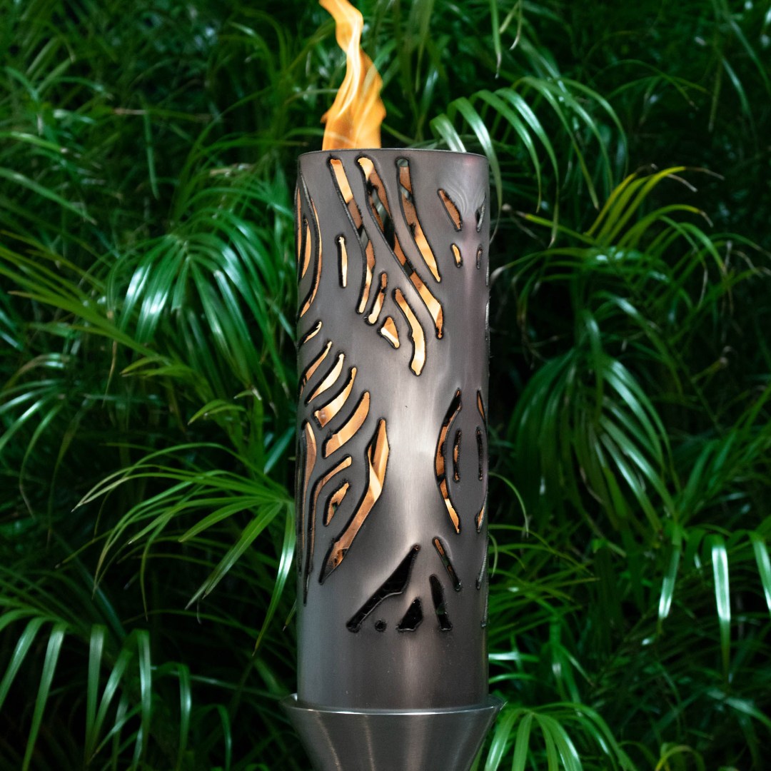 Metal torch with perforated cylinder and flame, outdoor patio torch