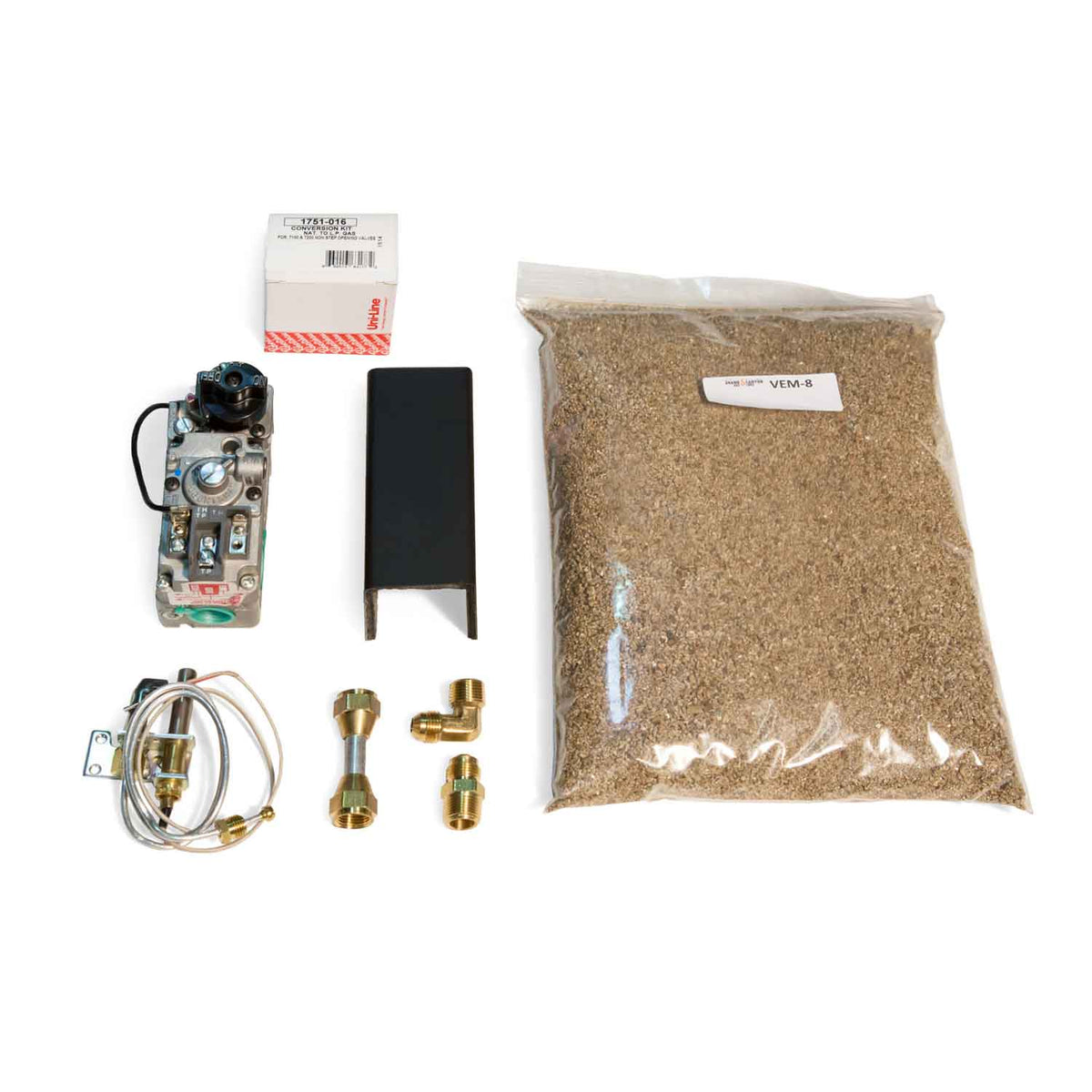 Gas valve kit parts: valve body, black plate, brass fittings, tubing, and granules bag