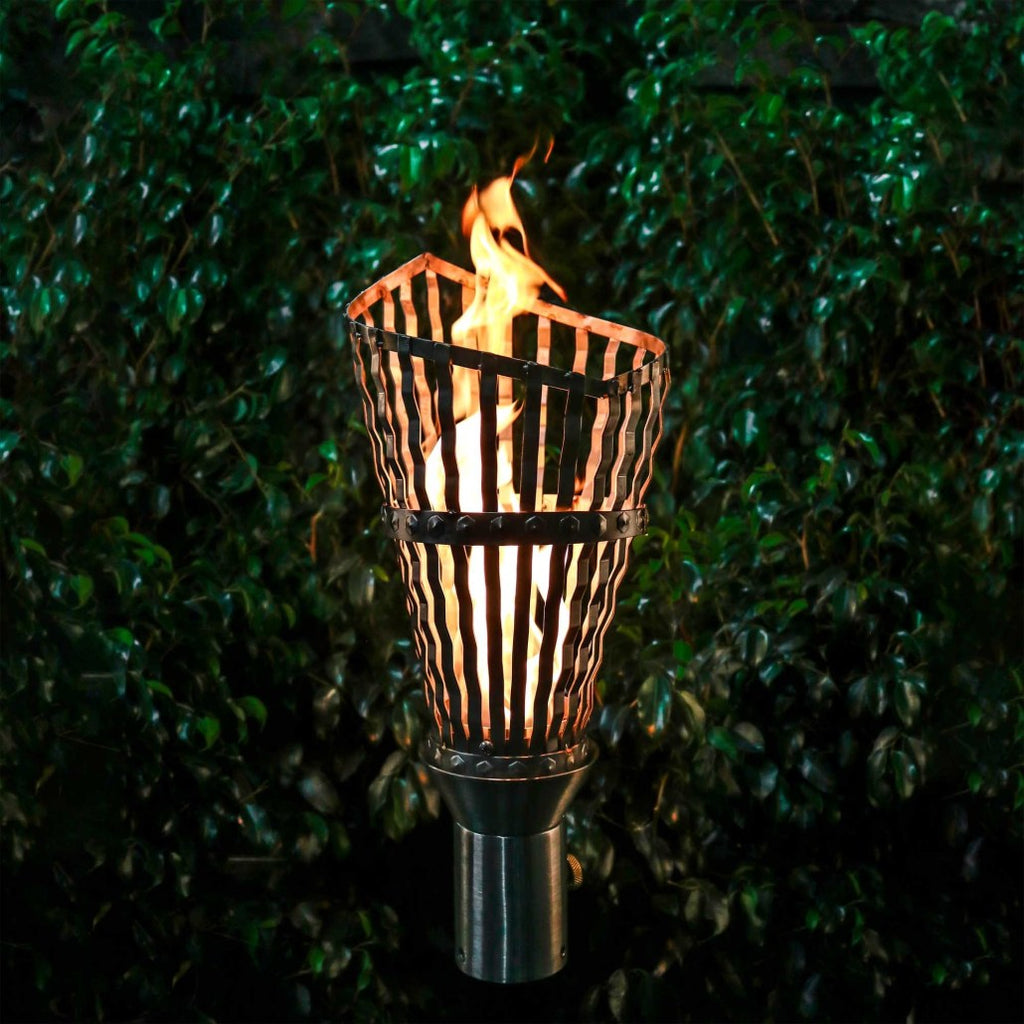 Roman torch fire with striped metal sleeve and flame on black stand